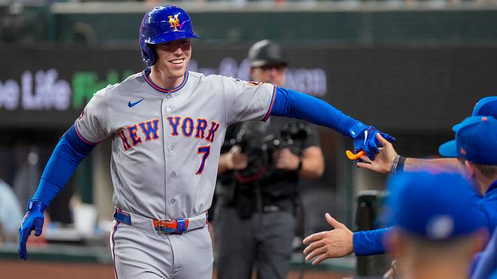 Sep 23, 2026; Arlington, Texas, USA; New York Mets third baseman Brett Baty (7) is greet at the dugout steps after hitting a grand slam home run against the Texas Rangers during the ninth inning at Globe Life Field. Mandatory Credit: Raymond Carlin III-Imagn Images Sep 23, 2026; Arlington, Texas, USA; New York Mets third baseman Brett Baty (7) is greet at the dugout steps after hitting a grand slam home run against the Texas Rangers during the ninth inning at Globe Life Field. Mandatory Credit: Raymond Carlin III-Imagn Images