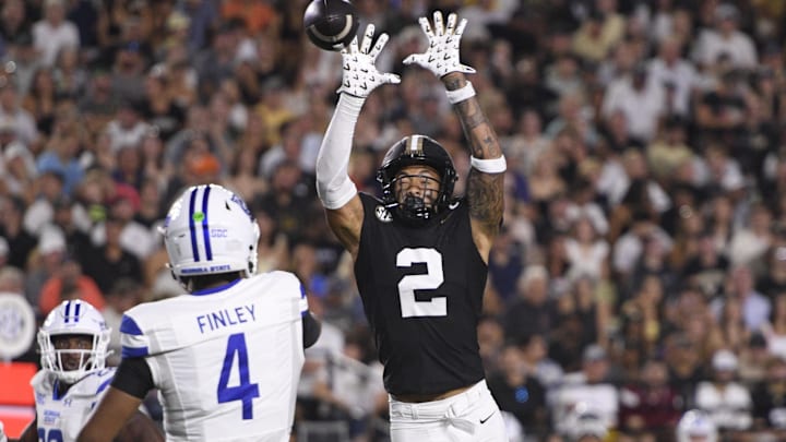 Sep 20, 2025; Nashville, Tennessee, USA; Vanderbilt Commodores linebacker Randon Fontenette (2) deflects the pass of Georgia State Panthers safety D-Icey Hopkins (4) during the first half at FirstBank Stadium. Mandatory Credit: Steve Roberts-Imagn Images Sep 20, 2025; Nashville, Tennessee, USA; Vanderbilt Commodores linebacker Randon Fontenette (2) deflects the pass of Georgia State Panthers safety D-Icey Hopkins (4) during the first half at FirstBank Stadium. Mandatory Credit: Steve Roberts-Imagn Images