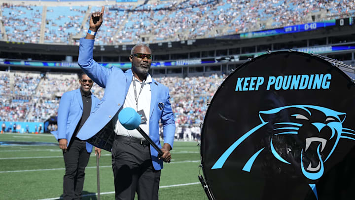 Oct 29, 2023; Charlotte, North Carolina, USA; Former Carolina Panthers greats Muhsin Muhammad salutes the crowd the crowd before the game at Bank of America Stadium. Oct 29, 2023; Charlotte, North Carolina, USA; Former Carolina Panthers greats Muhsin Muhammad salutes the crowd the crowd before the game at Bank of America Stadium.