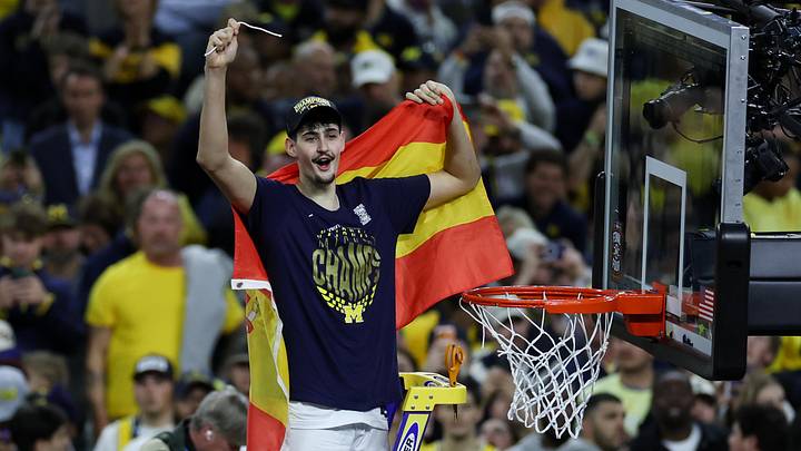 Apr 6, 2026; Indianapolis, IN, USA; Michigan Wolverines center Aday Mara (15) cuts down the net after defeating the UConn Huskies in the national championship of the Final Four of the men's 2026 NCAA Tournament at Lucas Oil Stadium. Mandatory Credit: Trevor Ruszkowski-Imagn Images Apr 6, 2026; Indianapolis, IN, USA; Michigan Wolverines center Aday Mara (15) cuts down the net after defeating the UConn Huskies in the national championship of the Final Four of the men's 2026 NCAA Tournament at Lucas Oil Stadium. Mandatory Credit: Trevor Ruszkowski-Imagn Images
