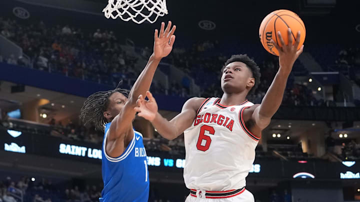 Mar 19, 2026; Buffalo, NY, USA; Georgia Bulldogs forward Kanon Catchings (6) shoots the ball against Saint Louis Billikens guard Isaac Holmes (12) during the second half of a first round game of the men's 2026 NCAA Tournament at Keybank Center. Mandatory Credit: Gregory Fisher-Imagn Images
