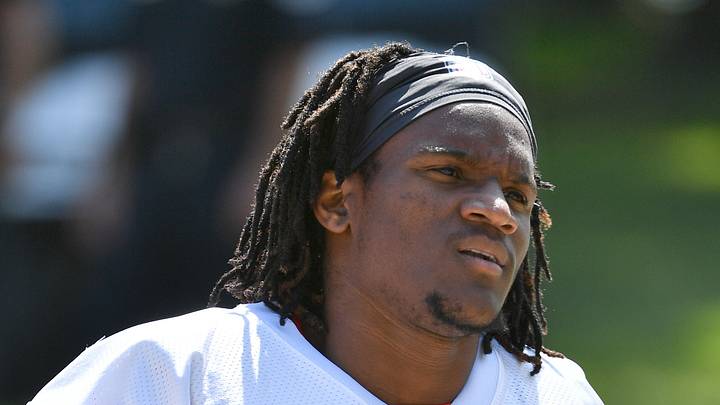 Cornerback Charvarius Ward stands on the sidelines