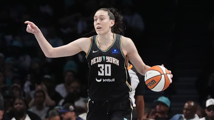 Sep 29, 2024; Brooklyn, New York, USA; New York Liberty forward Breanna Stewart (30) dribbles the ball against the Las Vegas Aces during game one of the 2024 WNBA Semi-finals at Barclays Center. Mandatory Credit: Gregory Fisher-Imagn Images