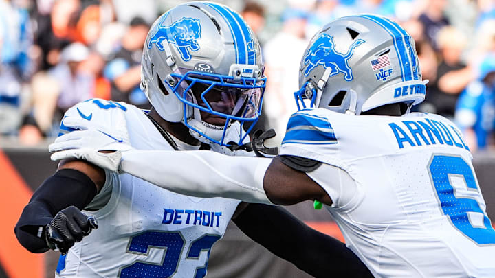Detroit Lions cornerback Rock Ya-Sin (23) and cornerback Terrion Arnold (6) warm up ahead of the Cincinnati Bengals game at Paycor Stadium in Cincinnati on Sunday, Oct. 5, 2025.