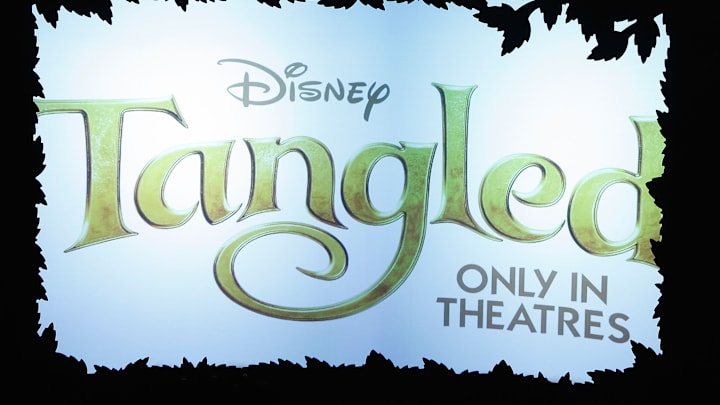 Mandy Moore And Zachary Levi Promote "Tangled" At The Disney Store