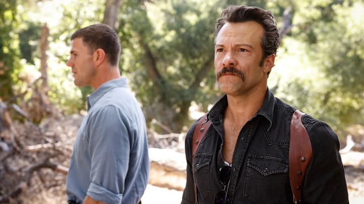 “The Funky Bunch” – NCIS: Origins. Pictured (L-R): Austin Stowell as Leroy Jethro Gibbs and Kyle Schmid as Mike Franks. Photo: Sonja Flemming/CBS ©2025 CBS Broadcasting, Inc. All Rights Reserved.