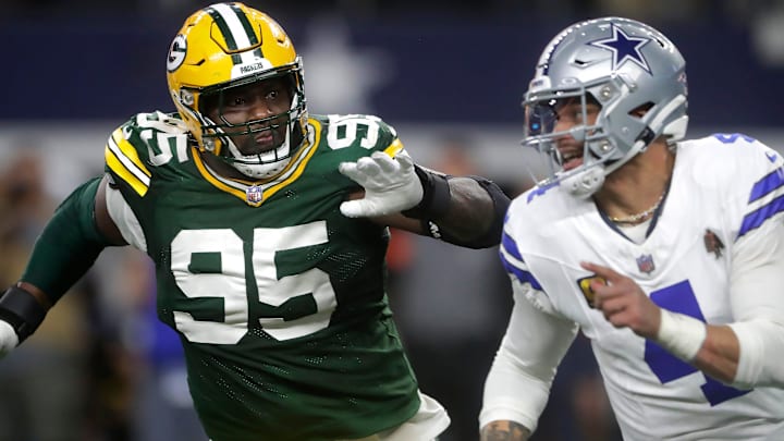 Green Bay Packers defensive tackle Devonte Wyatt rushes Dallas Cowboys quarterback Dak Prescott Green Bay Packers defensive tackle Devonte Wyatt rushes Dallas Cowboys quarterback Dak Prescott