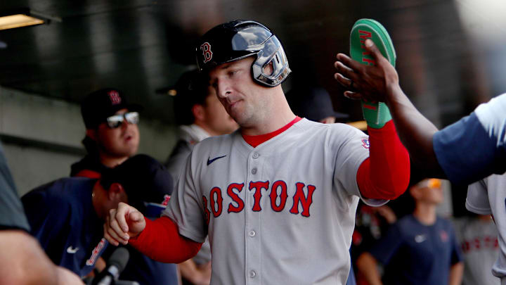 Sep 10, 2025; West Sacramento, California, USA; Boston Red Sox third baseman Alex Bregman (2) is congratulated by teammates after scoring a run against the Athletics during the third inning at Sutter Health Park. Mandatory Credit: Dennis Lee-Imagn Images
