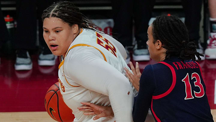 Iowa State Cyclones' center Audi Crooks (55) looks for drive to the basket as Arizona Wildcats forward Nora Francois (13) defends during the third quarter in the Big-12 women’s basketball on Jan. 24, 2026, at Hilton Coliseum in Ames, Iowa.