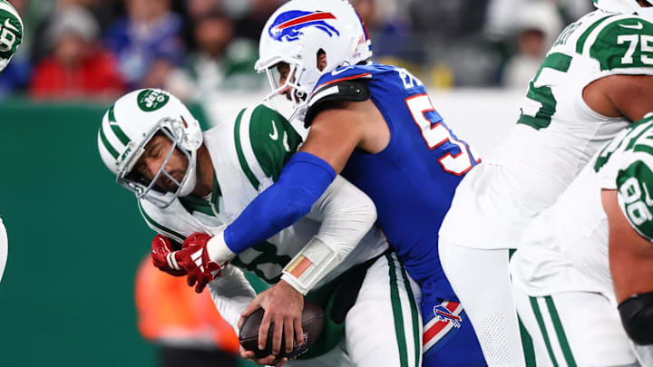 Oct 14, 2024; East Rutherford, New Jersey, USA; New York Jets quarterback Aaron Rodgers is sacked by Buffalo Bills defensive end AJ Epenesa. Oct 14, 2024; East Rutherford, New Jersey, USA; New York Jets quarterback Aaron Rodgers is sacked by Buffalo Bills defensive end AJ Epenesa.