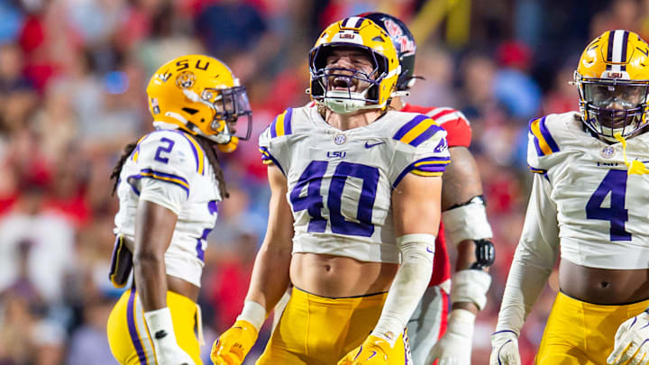 Linebacker Whit Weeks 40 sacks quarterback Jaxson Dart 2 as the LSU Tigers take on the Ole Miss Rebels at Tiger Stadium in Baton Rouge, LA. Saturday, Oct. 12, 2024.Saturday, Oct. 12, 2024.