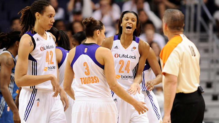 Sep 29, 2013; Phoenix, AZ, USA; Phoenix Mercury guard DeWanna Bonner (24) reacts to a call on the court with teammates guard Diana Taurasi (3) and center Brittney Griner (42) in the game against the Minnesota Lynx at US Airways Center. The Lynx defeated the Mercury 72-65. Mandatory Credit: Jennifer Stewart-Imagn Images