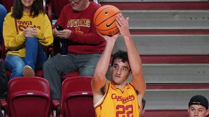 Iowa State Cyclones forward Milan Momcilovic (22) takes a three-point shot against FDU during the second half of the season-opener on Nov. 3, 2025, at Hilton Coliseum in Ames. Iowa State Cyclones forward Milan Momcilovic (22) takes a three-point shot against FDU during the second half of the season-opener on Nov. 3, 2025, at Hilton Coliseum in Ames.