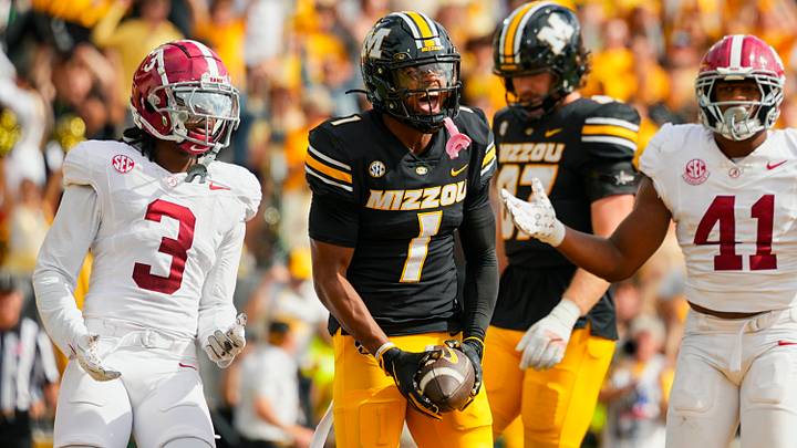 Oct 11, 2025; Columbia, Missouri, USA; Missouri Tigers wide receiver Donovan Olugbode (1) celebrates after scoring a touchdown during the second half against the Alabama Crimson Tide at Faurot Field at Memorial Stadium. Mandatory Credit: Jay Biggerstaff-Imagn Images Oct 11, 2025; Columbia, Missouri, USA; Missouri Tigers wide receiver Donovan Olugbode (1) celebrates after scoring a touchdown during the second half against the Alabama Crimson Tide at Faurot Field at Memorial Stadium. Mandatory Credit: Jay Biggerstaff-Imagn Images