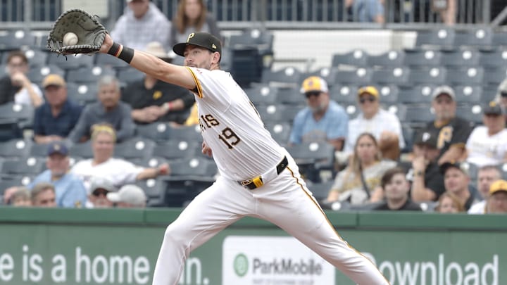 Pittsburgh, Pennsylvania, USA; Pittsburgh Pirates first baseman Jared Triolo (19) catches a wide throw to retire Milwaukee Brewers left fielder Sal Frelick (not pictured) during the sixth inning at PNC Park. Pittsburgh, Pennsylvania, USA; Pittsburgh Pirates first baseman Jared Triolo (19) catches a wide throw to retire Milwaukee Brewers left fielder Sal Frelick (not pictured) during the sixth inning at PNC Park.