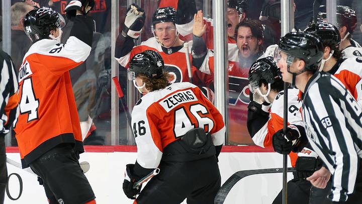 PHILADELPHIA, PENNSYLVANIA - APRIL 22: Christian Dvorak #22, Travis Konecny #11, Travis Sanheim #6, Porter Martone #94 and Jamie Drysdale #9 of the Philadelphia Flyers celebrate Trevor Zegras #46 second period goal against the Pittsburgh Penguins in Game Three of the First Round of the 2026 Stanley Cup Playoffs at the Xfinity Mobile Arena on April 22, 2026 in Philadelphia, Pennsylvania.