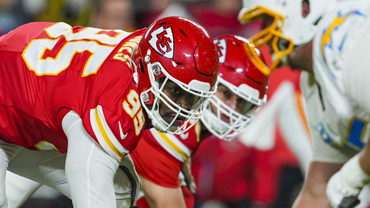 Dec 8, 2024; Kansas City, Missouri, USA; Kansas City Chiefs defensive tackle Chris Jones (95) and defensive end George Karlaftis (56) get ready before the snap during the first half against the Los Angeles Chargers at GEHA Field at Arrowhead Stadium. Mandatory Credit: Jay Biggerstaff-Imagn Images Dec 8, 2024; Kansas City, Missouri, USA; Kansas City Chiefs defensive tackle Chris Jones (95) and defensive end George Karlaftis (56) get ready before the snap during the first half against the Los Angeles Chargers at GEHA Field at Arrowhead Stadium. Mandatory Credit: Jay Biggerstaff-Imagn Images