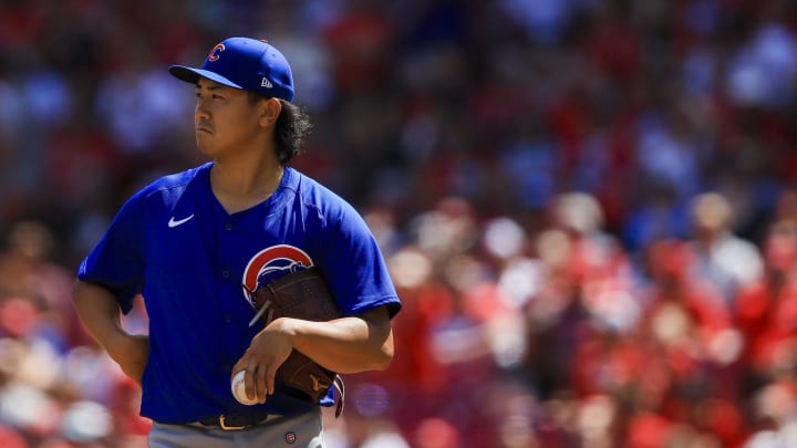 Chicago Cubs starting pitcher Shota Imanaga (18) stands on the field during a stop in play in the seventh inning against the Cincinnati Reds at Great American Ball Park on June 9.