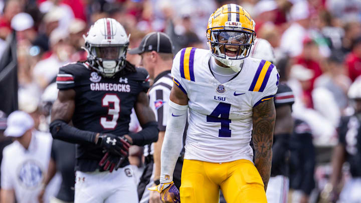 Sep 14, 2024; Columbia, South Carolina, USA; LSU Tigers wide receiver CJ Daniels (4) celebrates after a first down against the South Carolina Gamecocks during the second quarter at Williams-Brice Stadium. Mandatory Credit: Scott Kinser-Imagn Images