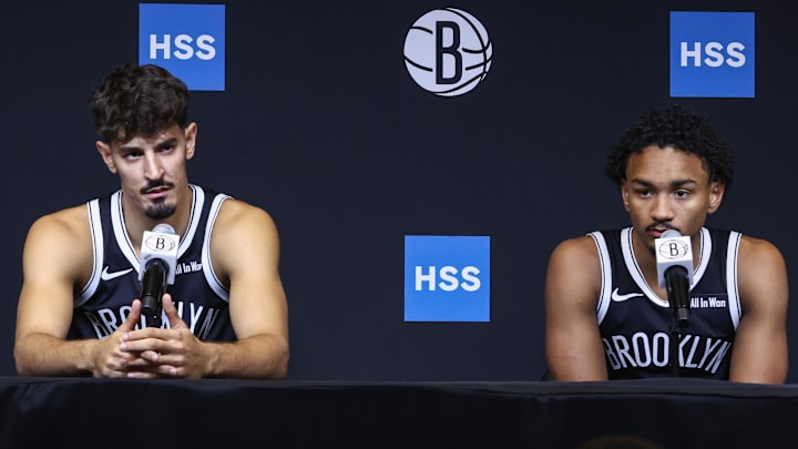 Sep 23, 2025; Brooklyn, NY, USA;  Brooklyn Nets guards Ben Saraf (77) and Kobe Bufkin (44) speak at Media Day. Mandatory Credit: Wendell Cruz-Imagn Images