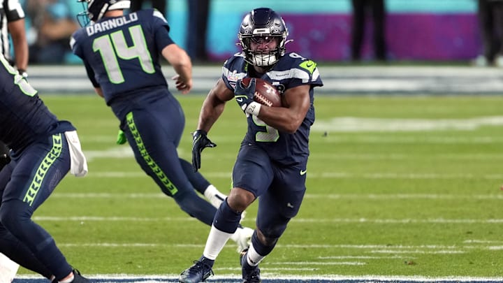 Feb 8, 2026; Santa Clara, CA, USA; Seattle Seahawks running back Kenneth Walker III (9) carries the ball against the New England Patriots during the fourth quarter in Super Bowl LX at Levi's Stadium. Mandatory Credit: Darren Yamashita-Imagn Images