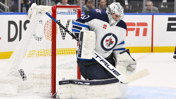 Apr 24, 2025; St. Louis, Missouri, USA; Winnipeg Jets goaltender Connor Hellebuyck (37) defends the net against the St. Louis Blues during the second period in game three of the first round of the 2025 Stanley Cup Playoffs at Enterprise Center. Mandatory Credit: Jeff Curry-Imagn Images