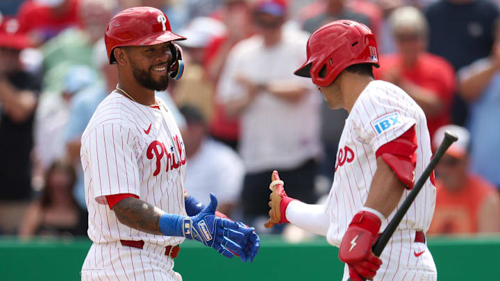 Mar 9, 2025; Clearwater, Florida, USA; Philadelphia Phillies shortstop Edmundo Sosa (33) celebrates after hitting a home run with infielder Otto Kemp (82) against the Baltimore Orioles in the third inning during spring trining at BayCare Ballpark Mar 9, 2025; Clearwater, Florida, USA; Philadelphia Phillies shortstop Edmundo Sosa (33) celebrates after hitting a home run with infielder Otto Kemp (82) against the Baltimore Orioles in the third inning during spring trining at BayCare Ballpark
