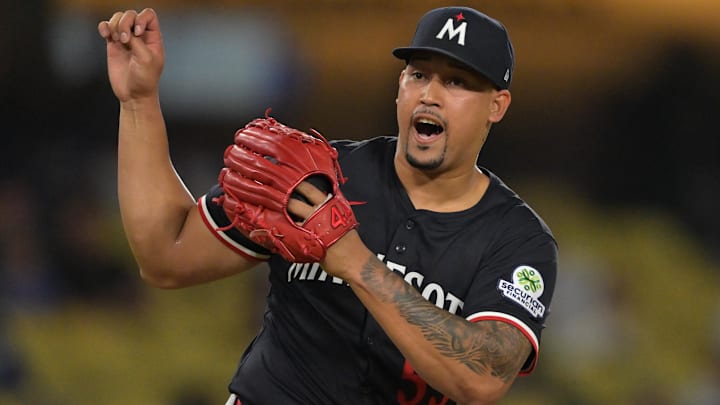 Jul 22, 2025; Los Angeles, California, USA;  Minnesota Twins relief pitcher Jhoan Duran (59) reacts after the final out of the ninth inning against the Los Angeles Dodgers at Dodger Stadium