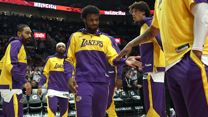 Apr 13, 2025; Portland, Oregon, USA;  Los Angeles Lakers guard Bronny James (9) enters the line up before playing in a game against the Portland Trail Blazers at Moda Center. Mandatory Credit: Jaime Valdez-Imagn Images