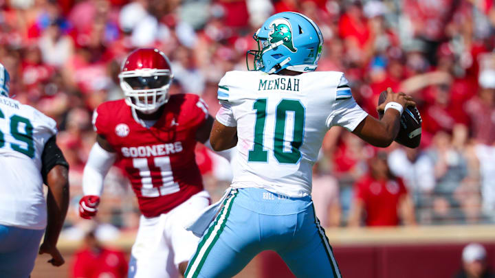 Sep 14, 2024; Norman, Oklahoma, USA;  Tulane Green Wave quarterback Darian Mensah (10) throws during the second quarter against the Oklahoma Sooners at Gaylord Family-Oklahoma Memorial Stadium. Mandatory Credit: Kevin Jairaj-Imagn Images