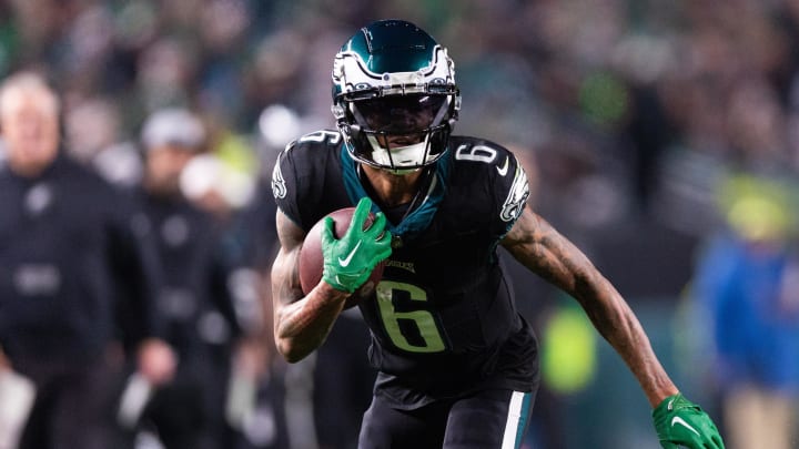 Dec 25, 2023; Philadelphia, Pennsylvania, USA; Philadelphia Eagles wide receiver DeVonta Smith (6) runs with the ball after a catch against the New York Giants during the second quarter at Lincoln Financial Field. Bill Streicher-USA TODAY Sports