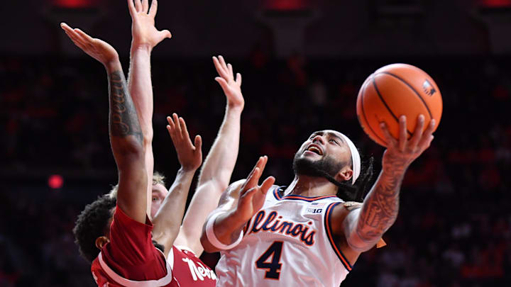 Dec 13, 2025; Champaign, Illinois, USA; Illinois Fighting Illini guard Kylan Boswell (4) drives to the basket during the first half against the Nebraska Cornhuskers at State Farm Center. Mandatory Credit: Ron Johnson-Imagn Images Dec 13, 2025; Champaign, Illinois, USA; Illinois Fighting Illini guard Kylan Boswell (4) drives to the basket during the first half against the Nebraska Cornhuskers at State Farm Center. Mandatory Credit: Ron Johnson-Imagn Images