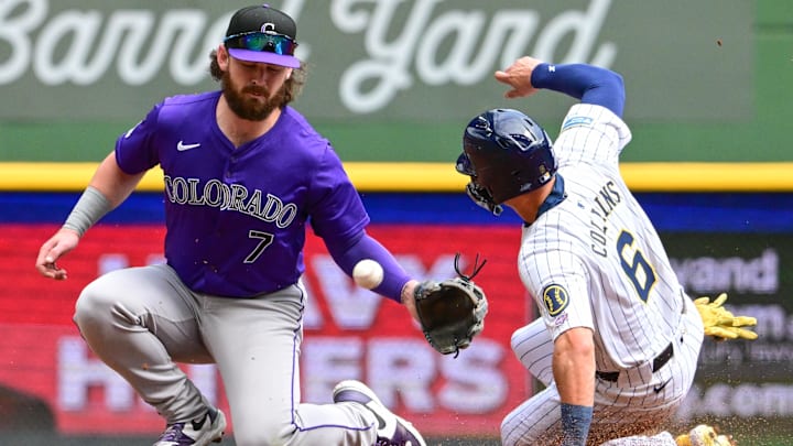 Sep 8, 2024; Milwaukee, Wisconsin, USA; Milwaukee Brewers left fielder Isaac Collins (6) steals second base as the ball gets past Colorado Rockies second baseman Brendan Rodgers (7) in the second inning at American Family Field. Sep 8, 2024; Milwaukee, Wisconsin, USA; Milwaukee Brewers left fielder Isaac Collins (6) steals second base as the ball gets past Colorado Rockies second baseman Brendan Rodgers (7) in the second inning at American Family Field.