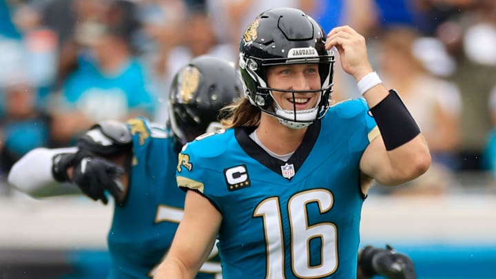 Jacksonville Jaguars quarterback Trevor Lawrence (16) smiles after wide receiver Christian Kirk (13), not shown, caught a reception during the fourth quarter of an NFL football matchup Sunday, Oct. 6, 2024 at EverBank Stadium in Jacksonville, Fla. The Jaguars edged the Colts on a field goal 37-34. [Corey Perrine/Florida Times-Union]