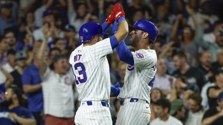 Jun 5, 2024; Chicago, Illinois, USA; Chicago Cubs outfielder Mike Tauchman (40) celebrates with shortstop David Bote (13) after scoring against the Chicago White Sox during the seventh inning at Wrigley Field. Jun 5, 2024; Chicago, Illinois, USA; Chicago Cubs outfielder Mike Tauchman (40) celebrates with shortstop David Bote (13) after scoring against the Chicago White Sox during the seventh inning at Wrigley Field.