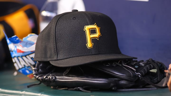 Sep 8, 2023; Atlanta, Georgia, USA; A detailed view of a Pittsburgh Pirates hat and glove before a