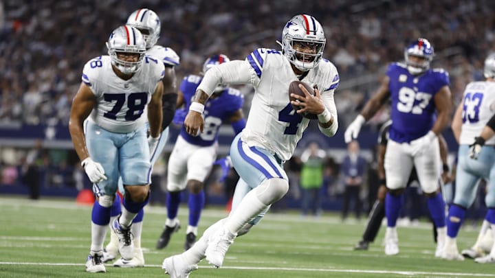 Dallas Cowboys quarterback Dak Prescott (4) runs for a touchdown in the second quarter against the New York Giants at AT&T Stadium. Dallas Cowboys quarterback Dak Prescott (4) runs for a touchdown in the second quarter against the New York Giants at AT&T Stadium.