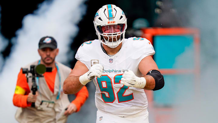 Miami Dolphins defensive tackle Zach Sieler (92) runs on the field before a game against the Buffalo Bills at Hard Rock Stadium. 
