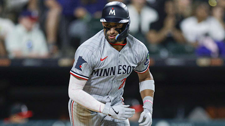 Aug 22, 2025; Chicago, Illinois, USA; Minnesota Twins third baseman Royce Lewis (23) runs after hitting a single against the Chicago White Sox during the ninth inning at Rate Field. Aug 22, 2025; Chicago, Illinois, USA; Minnesota Twins third baseman Royce Lewis (23) runs after hitting a single against the Chicago White Sox during the ninth inning at Rate Field.