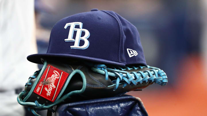 St. Petersburg, FL, USA; A detail view of a Tampa Bay Rays hat and glove at Tropicana Field.