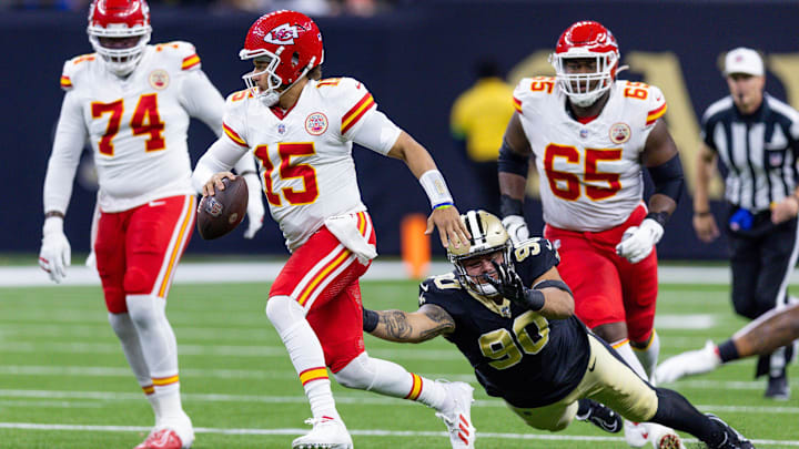New Orleans Saints defensive tackle Bryan Bresee (90) pressures Kansas City Chiefs quarterback Patrick Mahomes (15) 