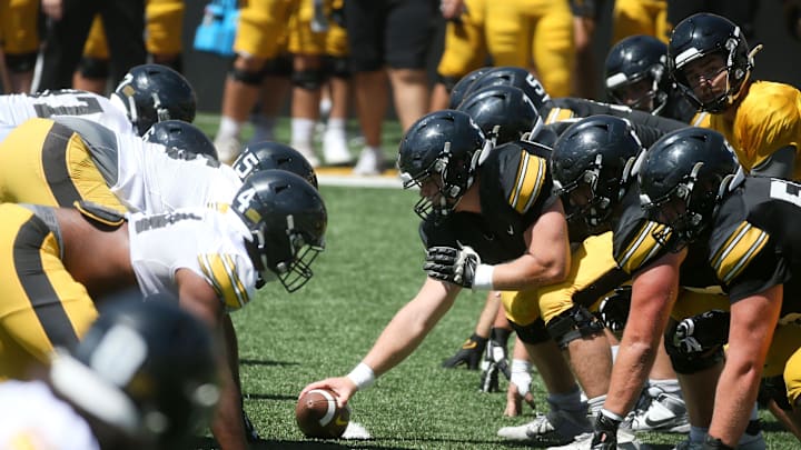 Iowa’s defensive line and offensive line get into position during Kids Day at Kinnick Saturday, Aug. 10, 2024 at Kinnick Stadium in Iowa City, Iowa.