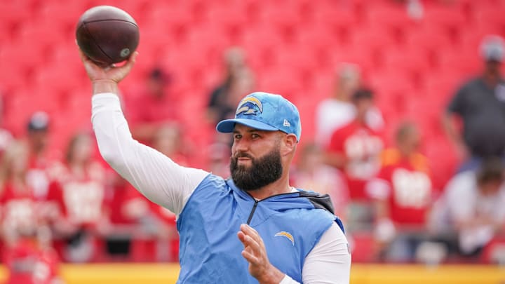 Sep 15, 2022; Kansas City, Missouri, USA; Los Angeles Chargers quarterback Chase Daniel (4) warms up against the Kansas City Chiefs prior to the game at GEHA Field at Arrowhead Stadium. Mandatory Credit: Denny Medley-Imagn Images