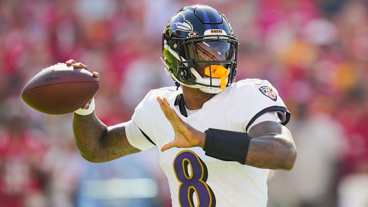 Sep 28, 2025; Kansas City, Missouri, USA; Baltimore Ravens quarterback Lamar Jackson (8) throws a pass during the first half against the Kansas City Chiefs at GEHA Field at Arrowhead Stadium. Mandatory Credit: Jay Biggerstaff-Imagn Images