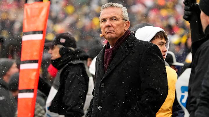 Former head coach Urban Meyer watches from the sideline during the NCAA football game between the Michigan Wolverines and the Ohio State Buckeyes at Michigan Stadium in Ann Arbor, Mich. on Nov. 29, 2025. Ohio State won 27-9. Former head coach Urban Meyer watches from the sideline during the NCAA football game between the Michigan Wolverines and the Ohio State Buckeyes at Michigan Stadium in Ann Arbor, Mich. on Nov. 29, 2025. Ohio State won 27-9.