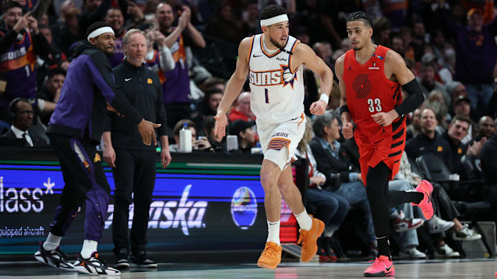 Feb 3, 2025; Portland, Oregon, USA; Phoenix Suns guard Devin Booker (1) reacts after scoring against the Portland Trail Blazers to make Booker the Suns’ all-time leading scorer in the second half at Moda Center. Mandatory Credit: Jaime Valdez-Imagn Images Feb 3, 2025; Portland, Oregon, USA; Phoenix Suns guard Devin Booker (1) reacts after scoring against the Portland Trail Blazers to make Booker the Suns’ all-time leading scorer in the second half at Moda Center. Mandatory Credit: Jaime Valdez-Imagn Images
