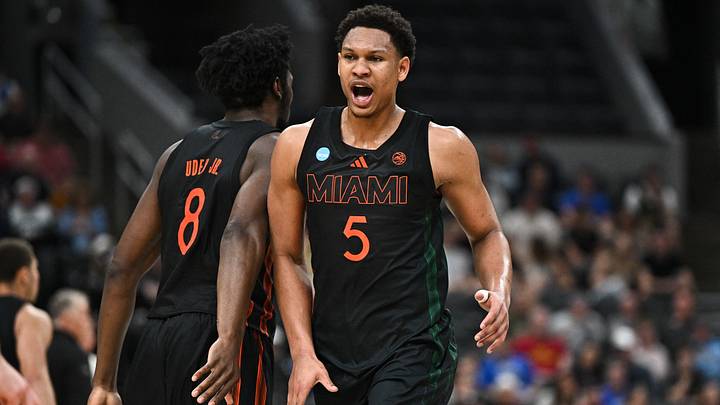 Mar 22, 2026; St. Louis, MO, USA; Miami Hurricanes forward Malik Reneau (5) celebrates with Miami Hurricanes center Ernest Udeh Jr. (8) after a play during the first half against the Purdue Boilermakers during a second round game of the men's 2026 NCAA Tournament at Enterprise Center. Mandatory Credit: Jeff Le-Imagn Images