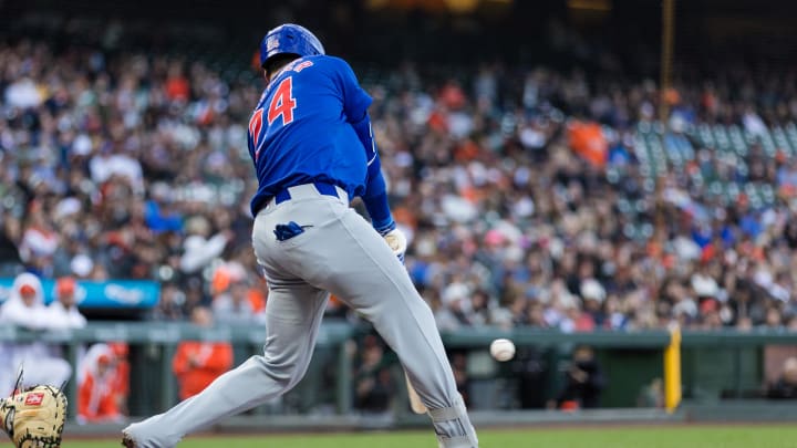 Jun 25, 2024; San Francisco, California, USA; Chicago Cubs right fielder Cody Bellinger (24) hits a single against the San Francisco Giants during the third inning at Oracle Park. Mandatory Credit: John Hefti-USA TODAY Sports