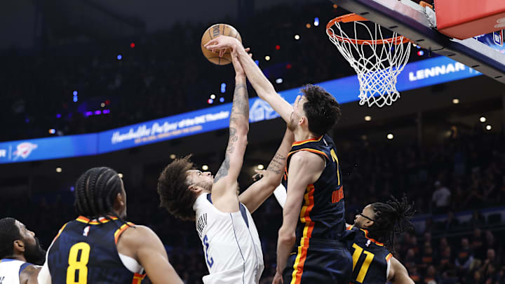 May 15, 2024; Oklahoma City, Oklahoma, USA; Oklahoma City Thunder forward Chet Holmgren (7) blocks a shot by Dallas Mavericks center Dereck Lively II (2) during the second half of game five of the second round for the 2024 NBA playoffs at Paycom Center. Mandatory Credit: Alonzo Adams-Imagn Images May 15, 2024; Oklahoma City, Oklahoma, USA; Oklahoma City Thunder forward Chet Holmgren (7) blocks a shot by Dallas Mavericks center Dereck Lively II (2) during the second half of game five of the second round for the 2024 NBA playoffs at Paycom Center. Mandatory Credit: Alonzo Adams-Imagn Images