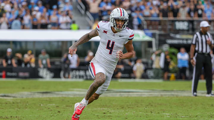 Nov 2, 2024; Orlando, Florida, USA; Arizona Wildcats wide receiver Tetairoa McMillan (4) during the second quarter against the UCF Knights at FBC Mortgage Stadium. Mandatory Credit: Mike Watters-Imagn Images
